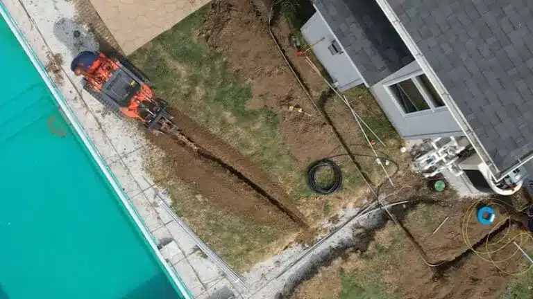 Trench and conduit installation for underground electrical service in Des Moines