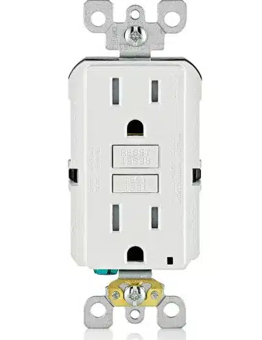 Electrician installing a GFCI outlet in a home