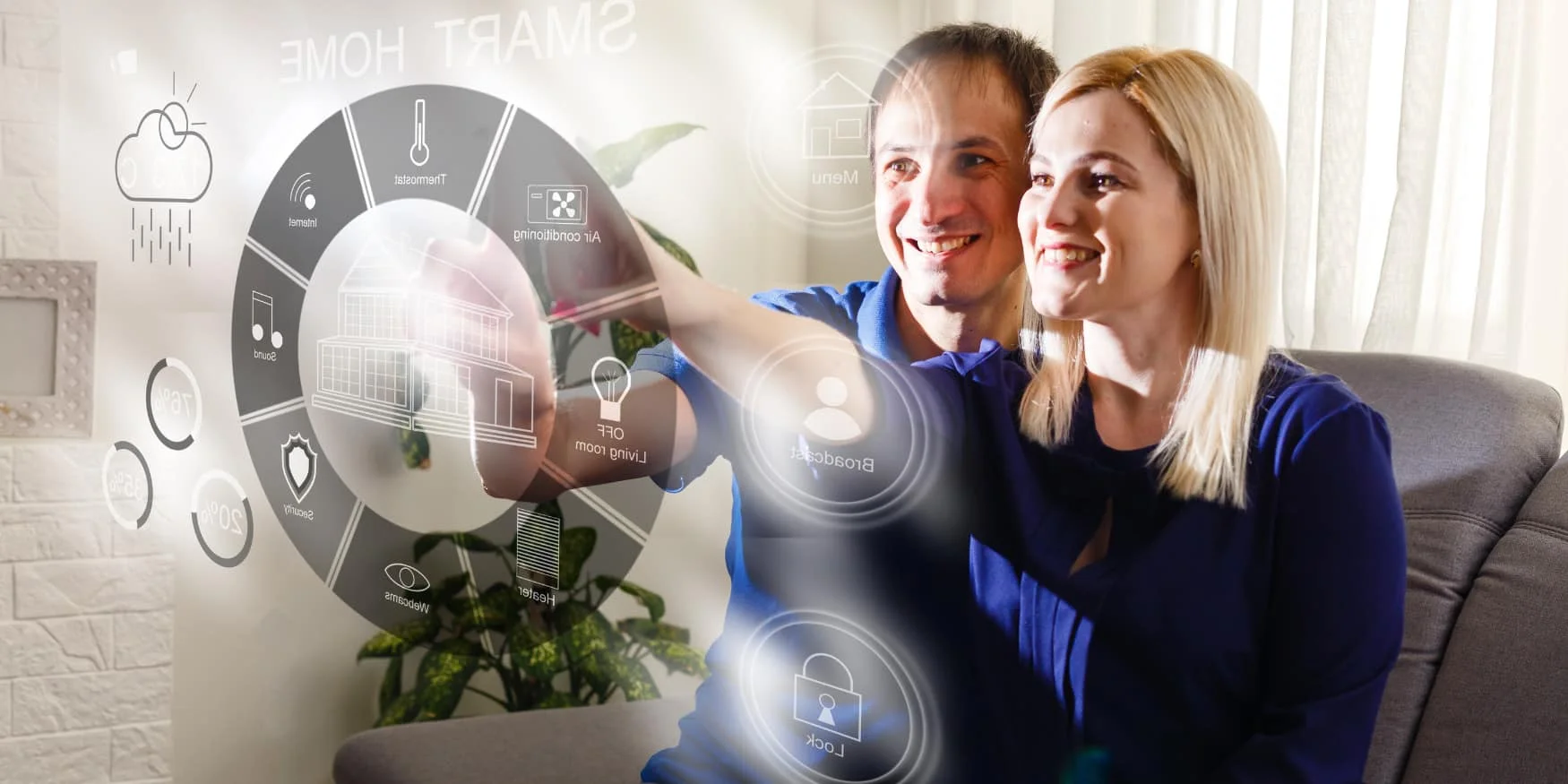 Couple interacting with smart home technology interface, showcasing electrical upgrades for convenience and efficiency in Des Moines, IA.